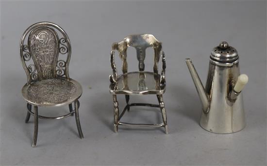 A Victorian silver miniature chocolate pot novelty pepperette, 1896, a captains chair, 1910 and another